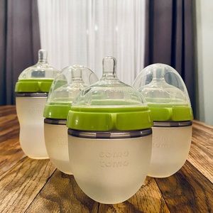 (4) como tomo Bottles